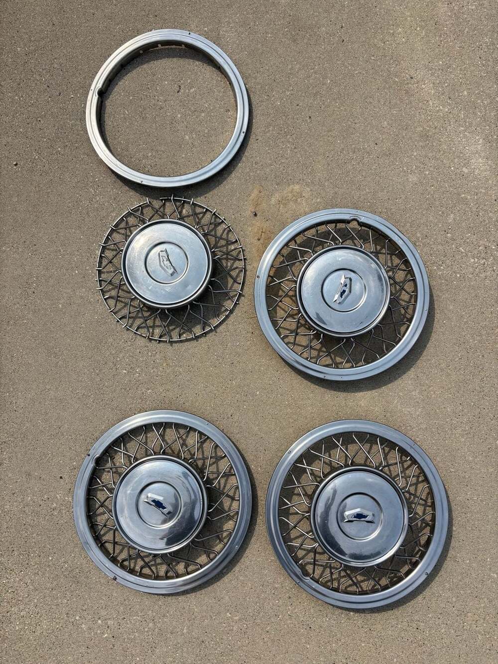 1955 Chevrolet Wire Wheel covers Hubcaps  accessory.